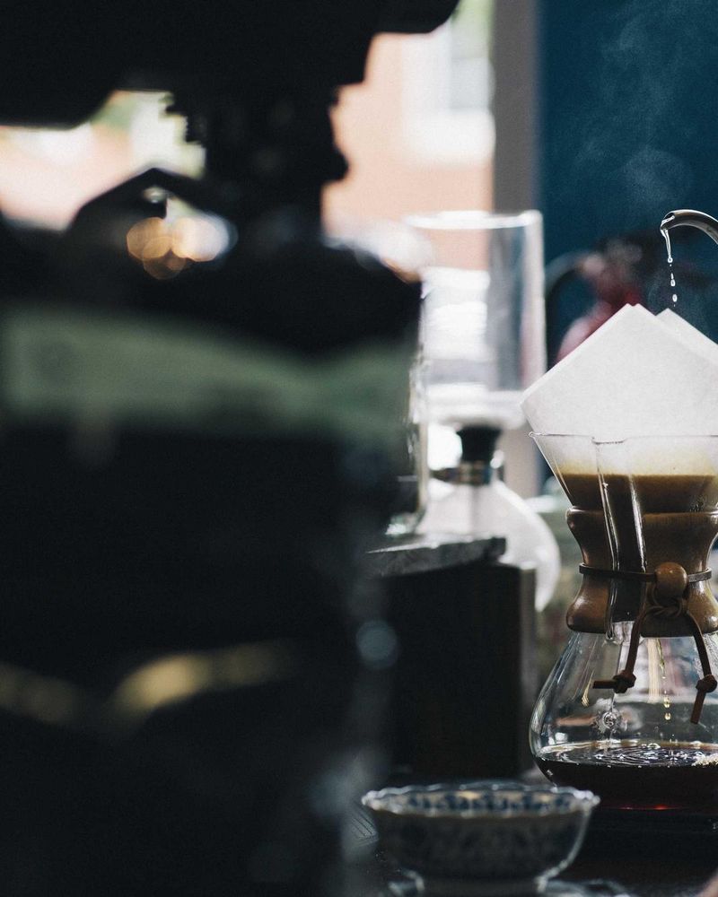 Coffee being poured slowly through a paper filter